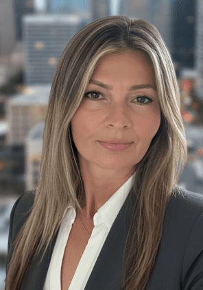 Professional woman in suit with city skyline